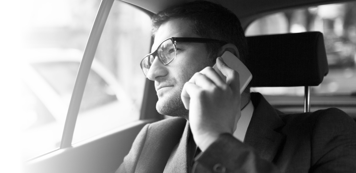 A man in a car on the phone