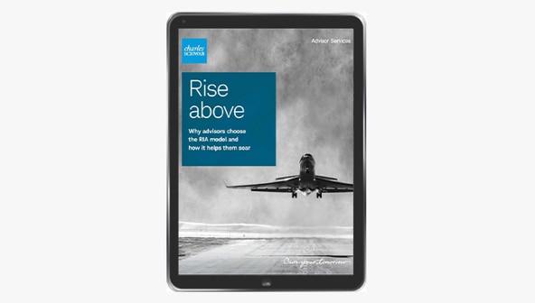 A tablet shows the cover of the Rise Above white paper.