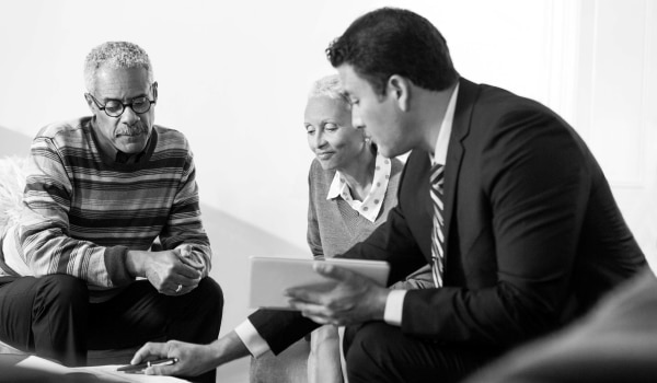 Advisor consulting with clients