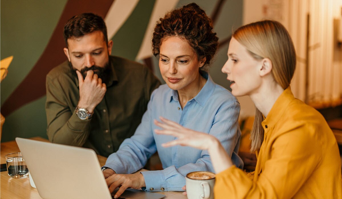 Group of business people discussing ideas and collaborating on a project