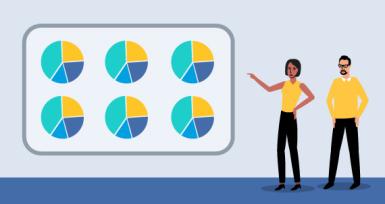 Two people looking at graphs and noticing patterns